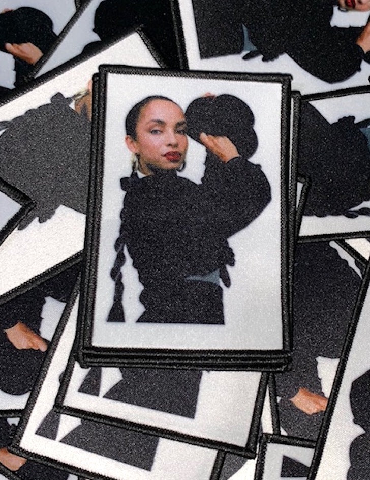 Sade with Black Hat Patch